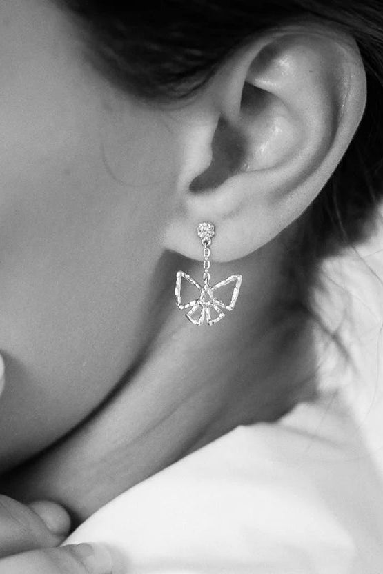 Bow Drop Earrings in Silver