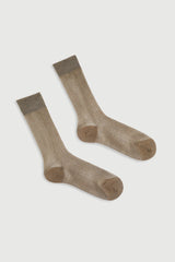 Pair of brown socks on a light gray background
