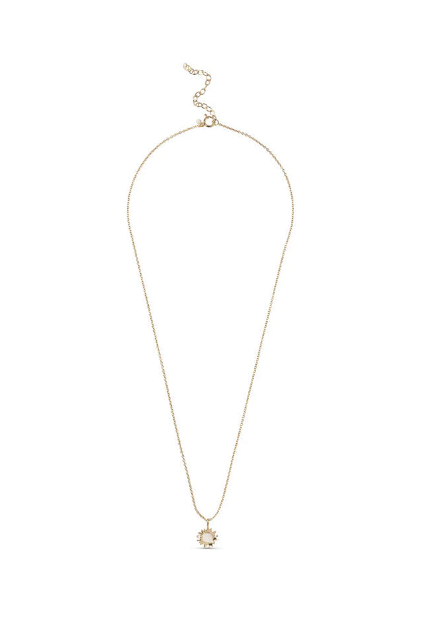 Gold necklace with a pendant on a white background