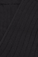 Close-up of black ribbed knit fabric