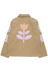 Brown jacket with floral designs on sleeves and a pink flower on back against a white background