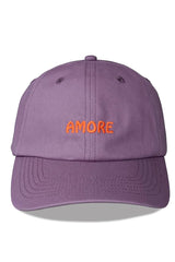 Purple cap with 'AMORE' embroidered on it against a white background
