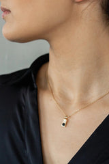 Checker Pendant Black in Gold