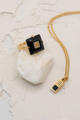 Checker Pendant Black in Gold