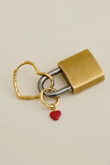 Medium Hammered Heart Hoops in Gold