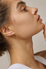 Medium Hammered Heart Hoops in Gold